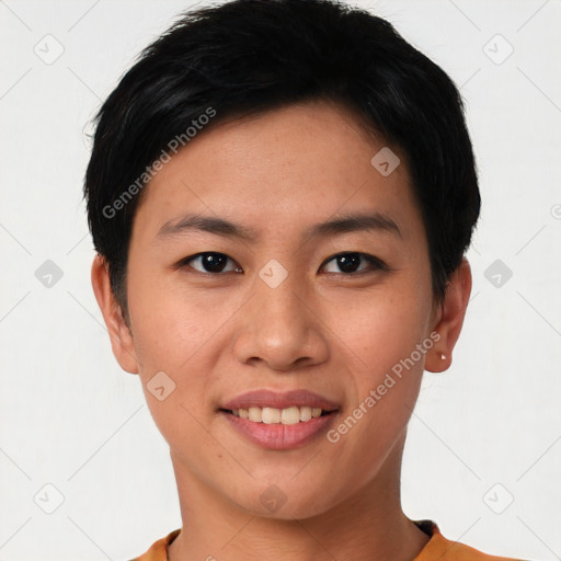 Joyful asian young-adult female with short  black hair and brown eyes