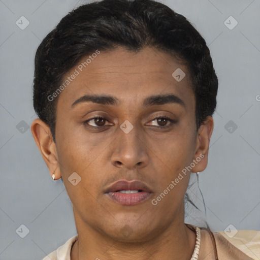 Joyful latino young-adult female with short  brown hair and brown eyes