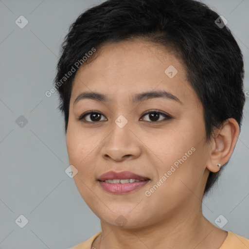 Joyful asian young-adult female with short  brown hair and brown eyes