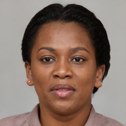 Neutral black adult female with short  black hair and brown eyes