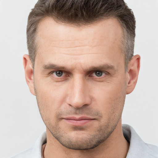 Neutral white adult male with short  brown hair and brown eyes