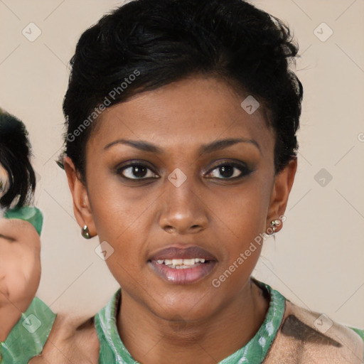 Joyful black young-adult female with short  brown hair and brown eyes