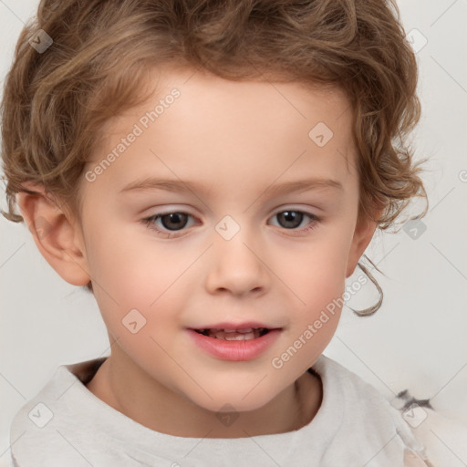 Joyful white child male with short  brown hair and brown eyes