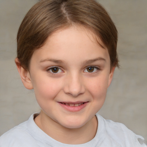 Joyful white child female with short  brown hair and brown eyes