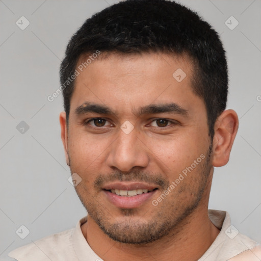 Joyful white young-adult male with short  brown hair and brown eyes