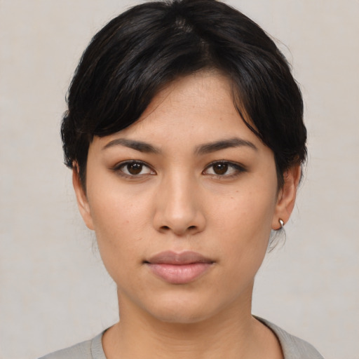 Neutral asian young-adult female with medium  black hair and brown eyes