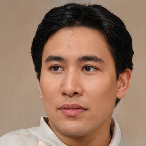 Neutral asian young-adult male with short  brown hair and brown eyes