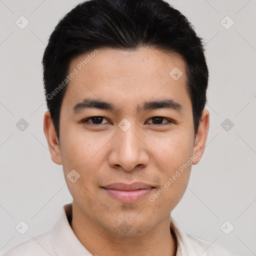 Joyful asian young-adult male with short  black hair and brown eyes