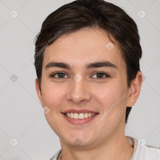 Joyful white young-adult female with short  brown hair and brown eyes