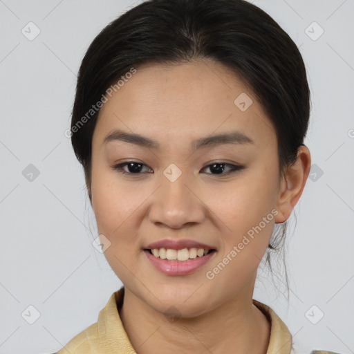 Joyful asian young-adult female with medium  brown hair and brown eyes