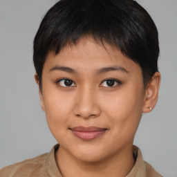 Joyful asian young-adult female with short  brown hair and brown eyes