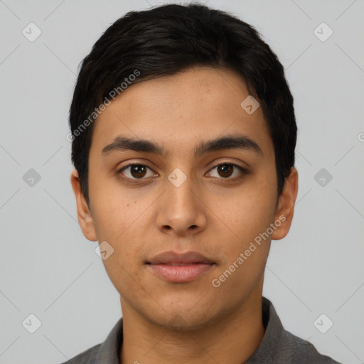 Neutral latino young-adult male with short  black hair and brown eyes