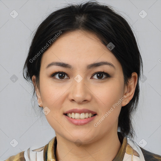 Joyful latino young-adult female with medium  brown hair and brown eyes
