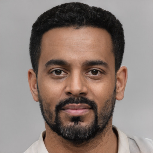 Neutral black young-adult male with short  black hair and brown eyes