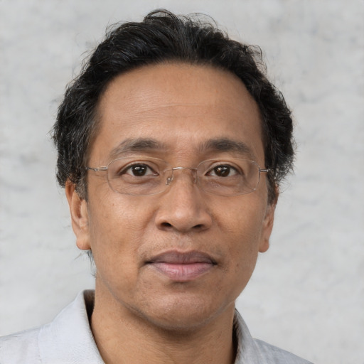 Neutral asian adult male with short  brown hair and brown eyes