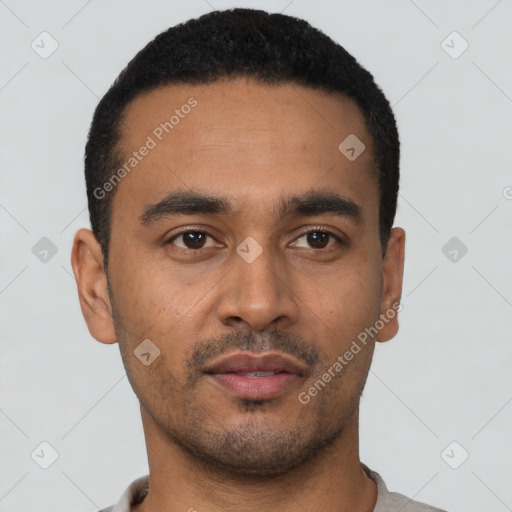 Neutral latino young-adult male with short  black hair and brown eyes