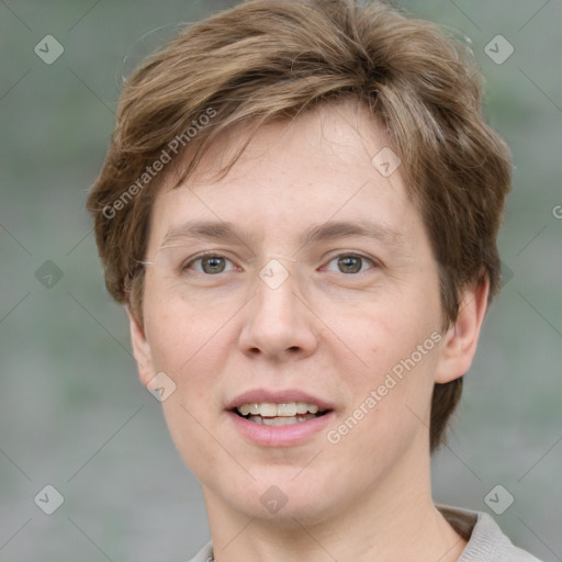 Joyful white young-adult female with short  brown hair and grey eyes