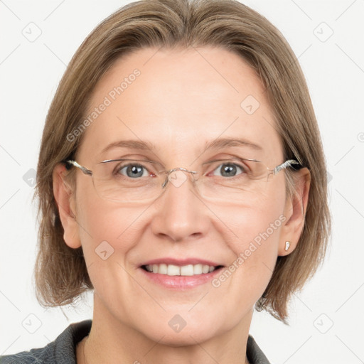 Joyful white adult female with medium  brown hair and grey eyes