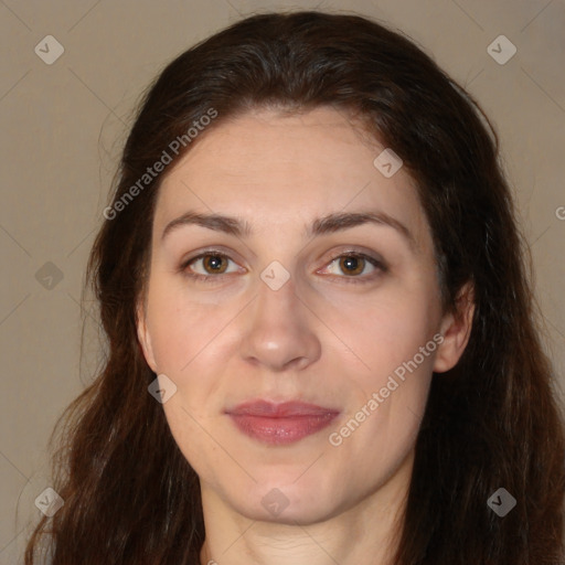 Joyful white adult female with long  brown hair and brown eyes