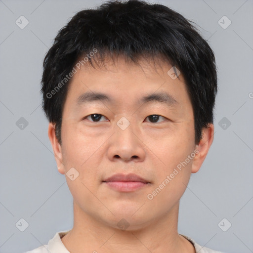 Neutral asian young-adult male with short  brown hair and brown eyes