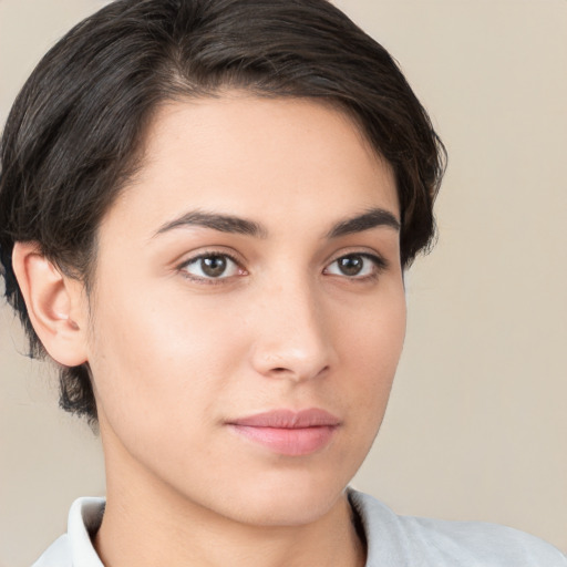 Neutral white young-adult female with short  brown hair and brown eyes