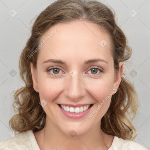 Joyful white young-adult female with medium  brown hair and green eyes