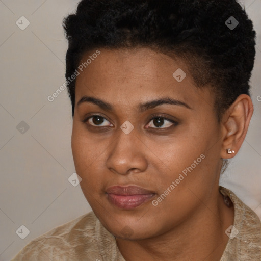 Joyful black young-adult female with short  brown hair and brown eyes