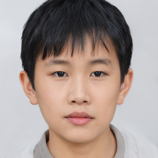 Neutral asian child male with short  brown hair and brown eyes