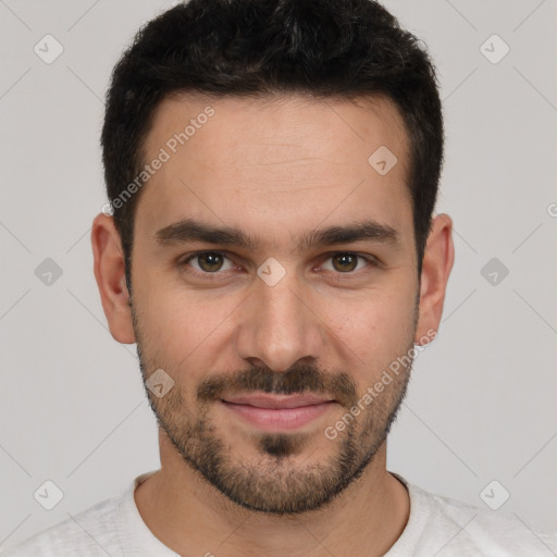 Joyful white young-adult male with short  black hair and brown eyes