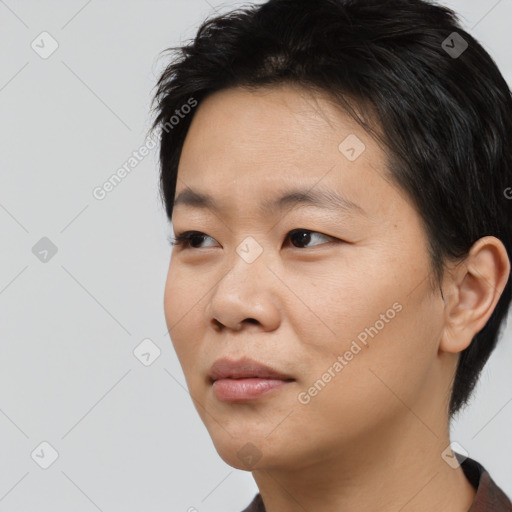 Neutral asian young-adult male with short  black hair and brown eyes