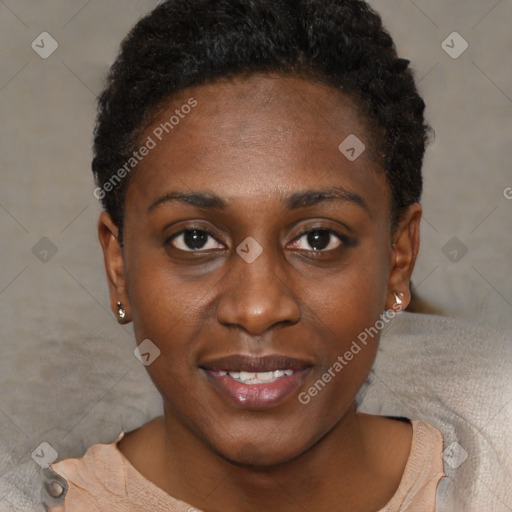 Joyful black young-adult female with short  brown hair and brown eyes