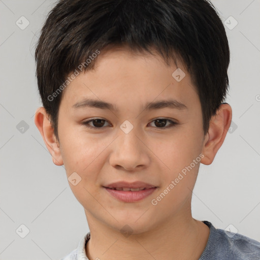 Joyful white child male with short  brown hair and brown eyes