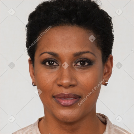 Joyful black young-adult female with short  black hair and brown eyes