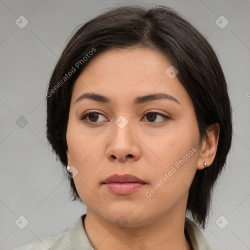 Neutral asian young-adult female with medium  brown hair and brown eyes