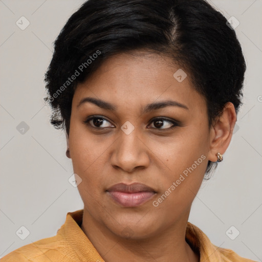 Joyful latino young-adult female with short  brown hair and brown eyes