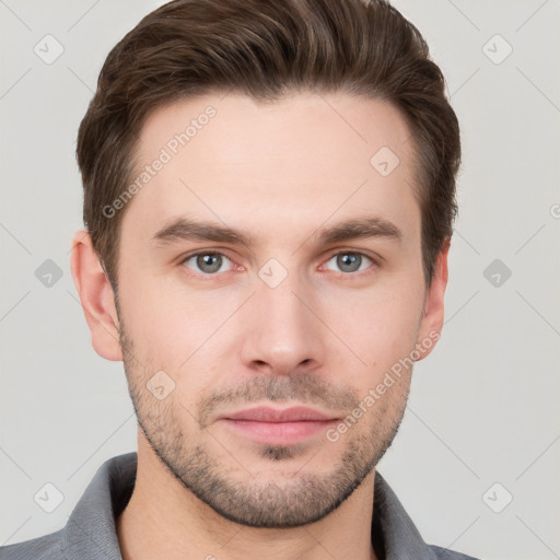 Neutral white young-adult male with short  brown hair and grey eyes