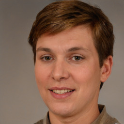 Joyful white adult female with short  brown hair and brown eyes