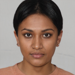 Neutral asian young-adult female with short  brown hair and brown eyes