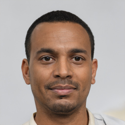 Neutral black young-adult male with short  black hair and brown eyes