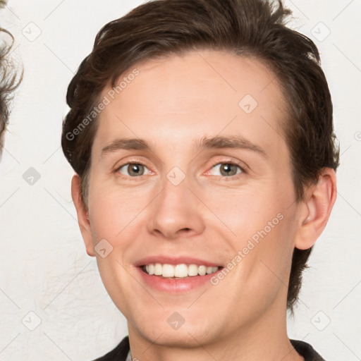 Joyful white young-adult male with medium  brown hair and brown eyes