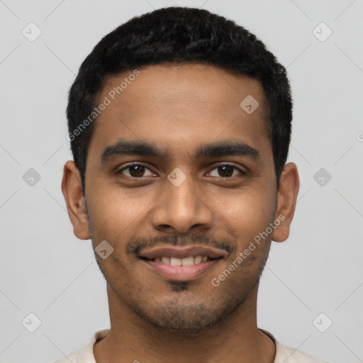 Joyful latino young-adult male with short  black hair and brown eyes