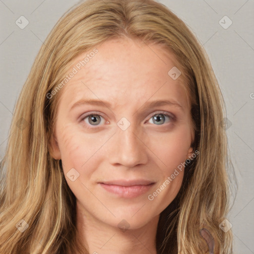 Joyful white young-adult female with long  brown hair and blue eyes