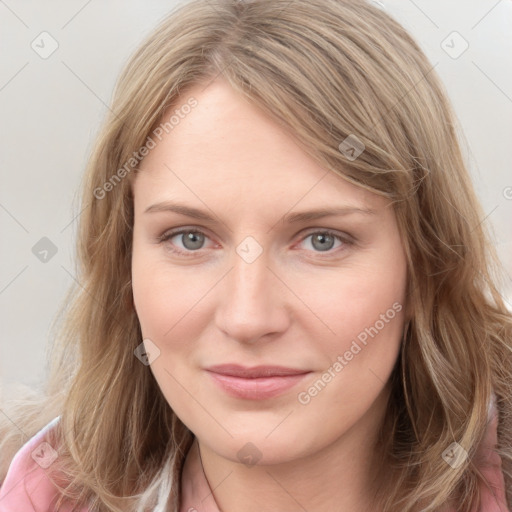 Joyful white young-adult female with medium  brown hair and blue eyes