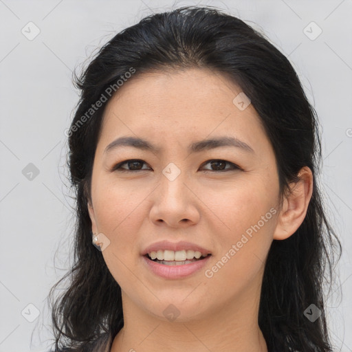 Joyful white young-adult female with long  brown hair and brown eyes