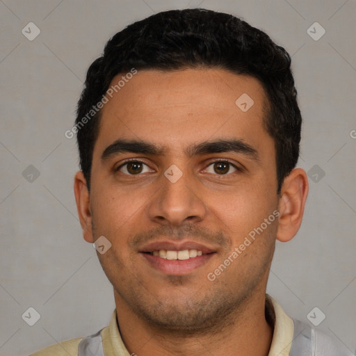 Joyful latino young-adult male with short  black hair and brown eyes