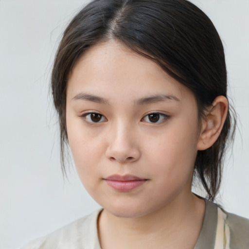 Neutral asian child female with medium  brown hair and brown eyes