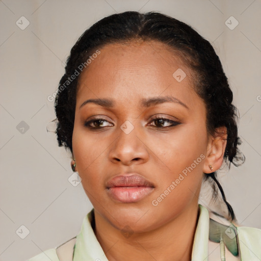 Neutral black young-adult female with medium  brown hair and brown eyes