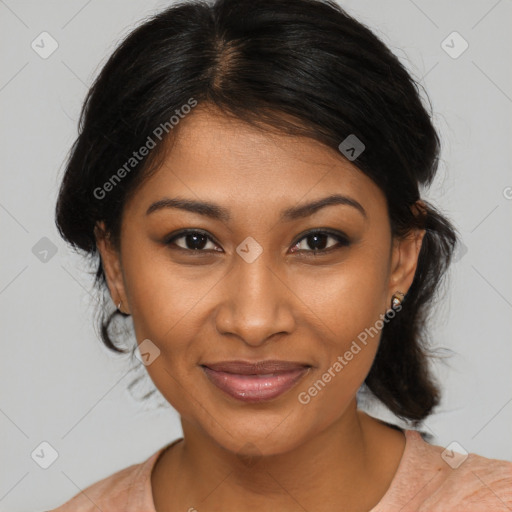 Joyful black young-adult female with medium  brown hair and brown eyes