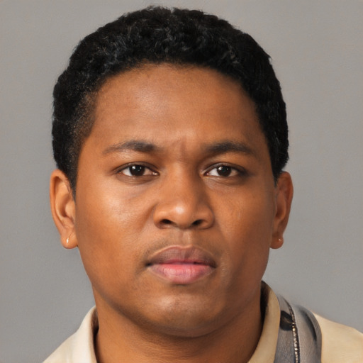 Neutral black young-adult male with short  black hair and brown eyes