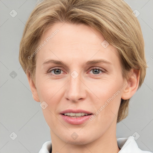 Joyful white adult female with medium  brown hair and grey eyes